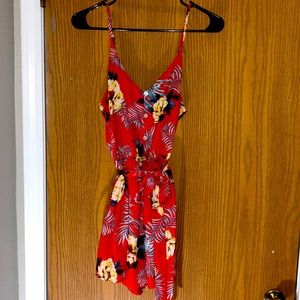 As U Wish size L (fits smaller) red, floral romper